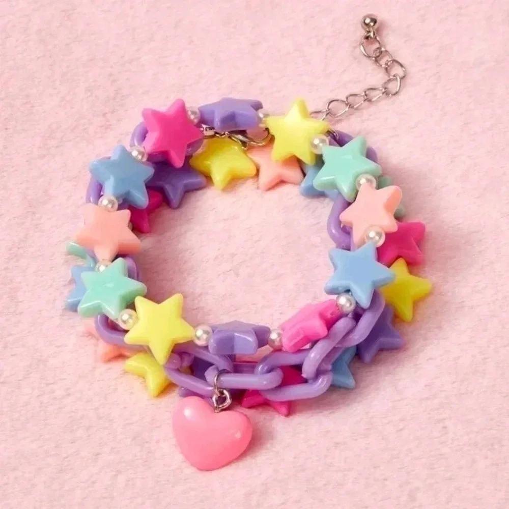 Three piece pastel purple rainbow color graphic Star girls bracelet set jewelry